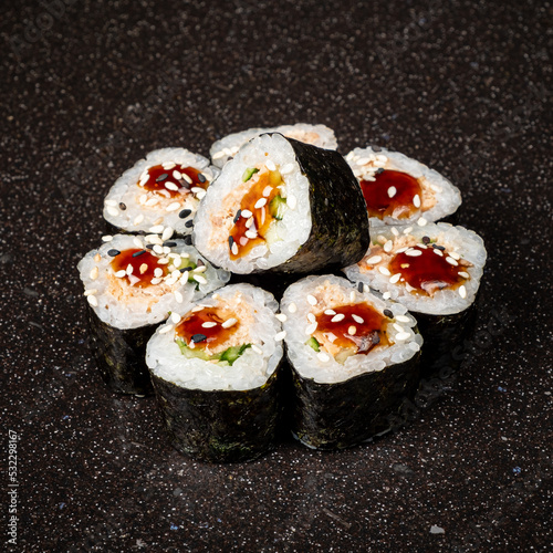 tasty sushi on the black background