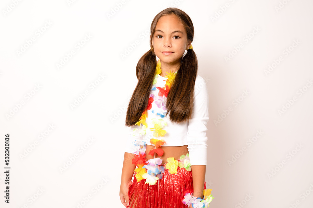 little child girl in hawaiian costume standing isolated white background