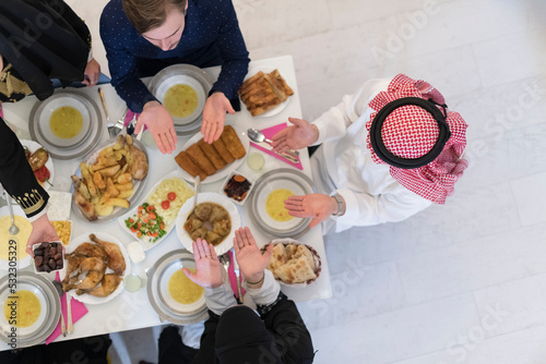 Top view of muslim family having Iftar during Ramadan holy month