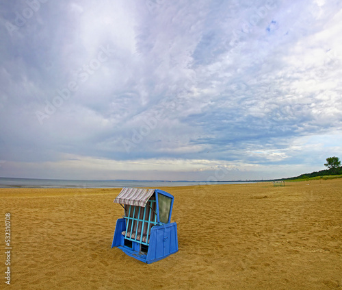 Hooded beach chair at the Baltic sea in Swinoujscie, Poland photo