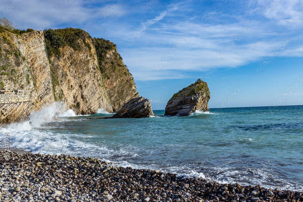 Coastline scenery View of Exotic beach Sveti Nikola island and budva riviera. the main excursion site Montenegro, Adriatic sea, Europe. Paradise beach on an island in the sea. High quality photo. Coastline scenery View of Exotic beach Sveti Nikola island and budva riviera. the main excursion site Montenegro, Adriatic sea, Europe. Paradise beach on an island in the sea. High quality photo.