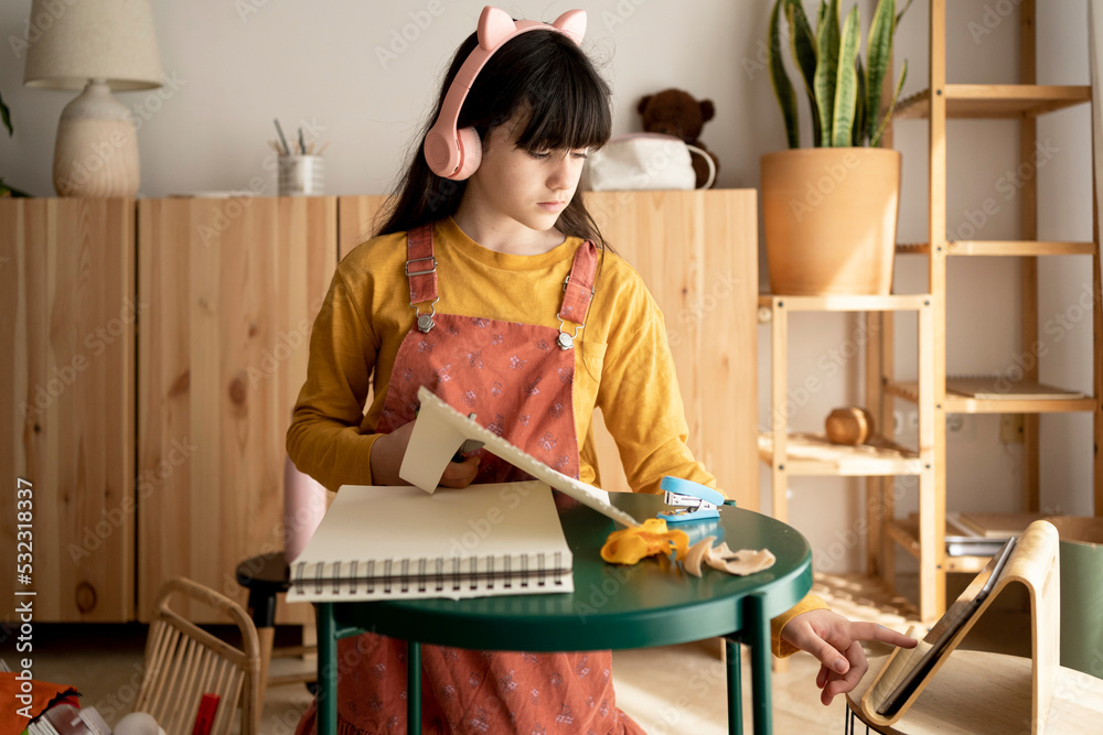 Cute girl doing homework from home Cute girl doing homework from home