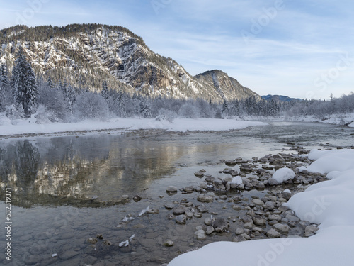 River Isar near Sylvenstein Reservoir close to village in the Karwendel mountain range during winter. Germany, Upper Bavaria