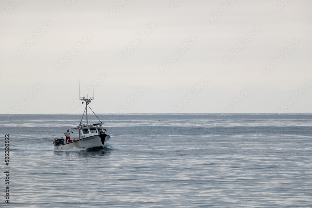 Fisherman Stands On The Back Of Troller Fisherman Stands On The Back Of Troller