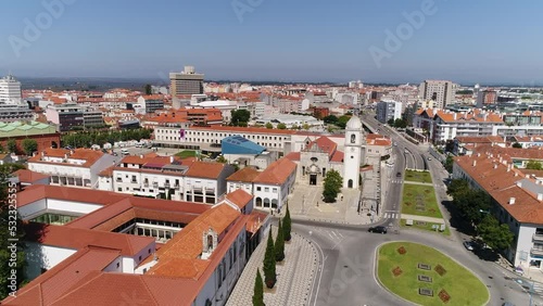 Aerial View City Center of Aveiro Portugal 4k. Aveiro aerial cityscape. Tourists enjoying tour on moliceiros, tradition boats of Ria de Aveiro. Venice of Portugal. Travel Destination.