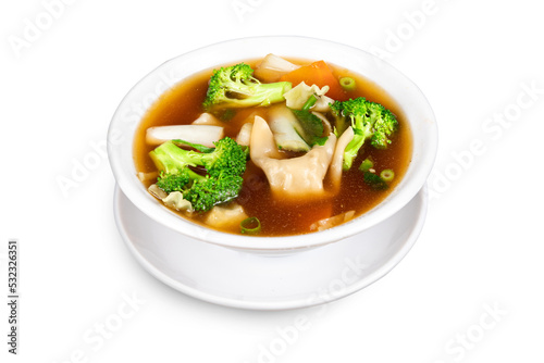Chinese and oriental delicacy Wonton Soup with vegetable or meat filled wonton noodles and broccoli in a white dish isolated on white