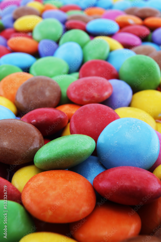 Multi coloured halloween candy sweets background with differential focus Multi coloured halloween candy sweets background with differential focus