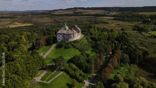 Aerial panoramic view of the surviving medieval rectangular fort Zolochiv Castle in Ukraine, drone flies backward
