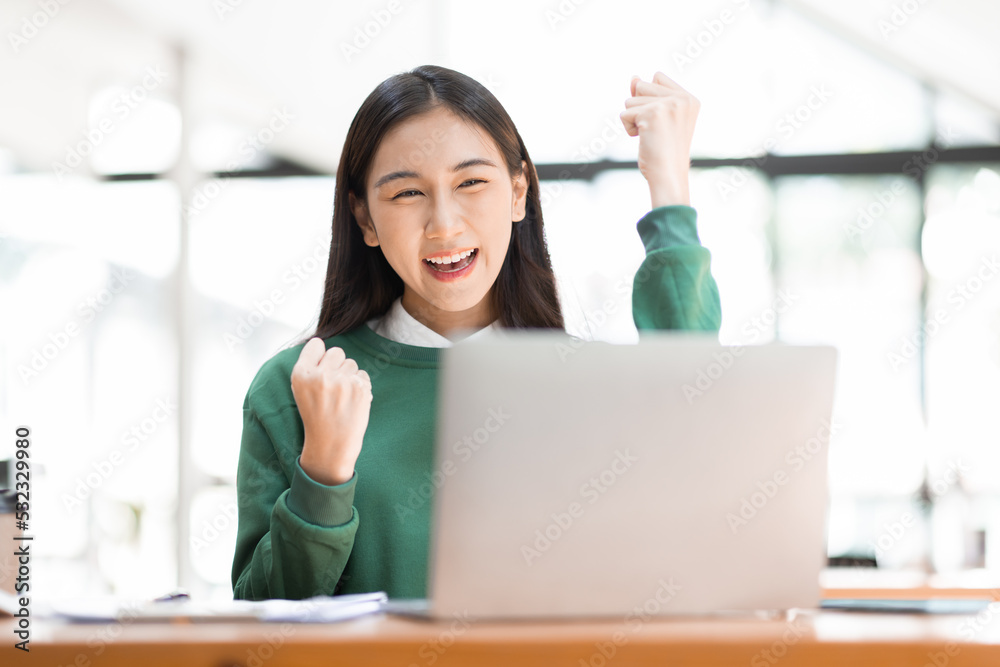 Young adult happy smiling Hispanic Asian student talking on online chat meeting using laptop in university campus or at virtual office. College female student learning remotely. Young adult happy smiling Hispanic Asian student talking on online chat meeting using laptop in university campus or at virtual office. College female student learning remotely.