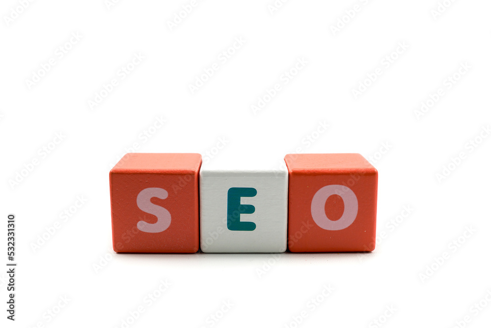 Word Search Engine Optimization SEO written on wooden cubes Word Search Engine Optimization SEO written on wooden cubes