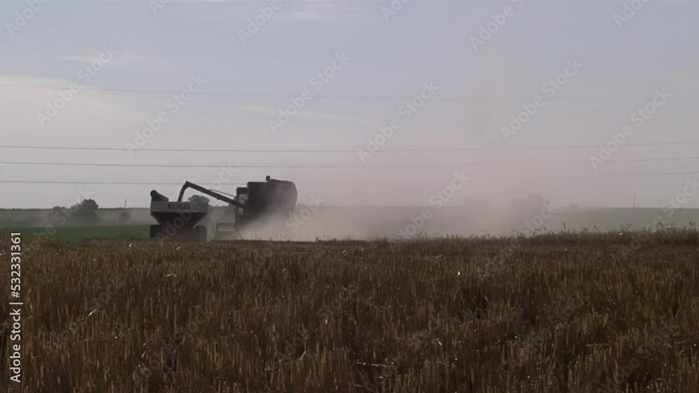 Combine Harvester working in Field in Entre Rios Province, Argentina. Combine Harvester working in Field in Entre Rios Province, Argentina.