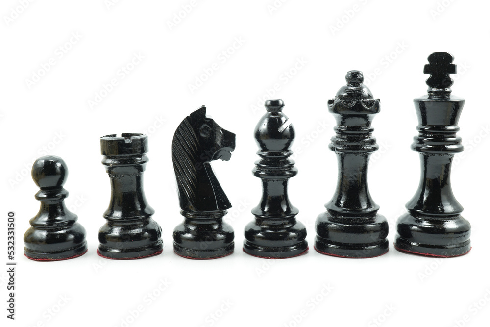 Black chess pieces made of wood in descending order isolated on white Black chess pieces made of wood in descending order isolated on white