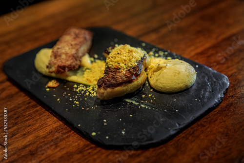 Spanish pintxos with foie gras in a bar in San Sebastian, Basque Country, Spain