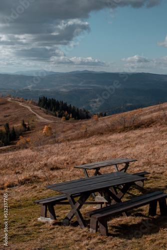 Autumn landscape with table on foreground. Beautiful day in the mountains