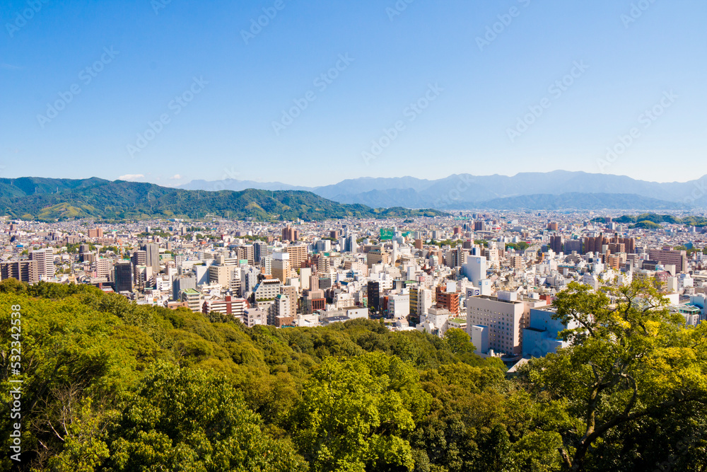Cityscape of Matsuyama city in Ehime prefecture, Shikoku, Japan.