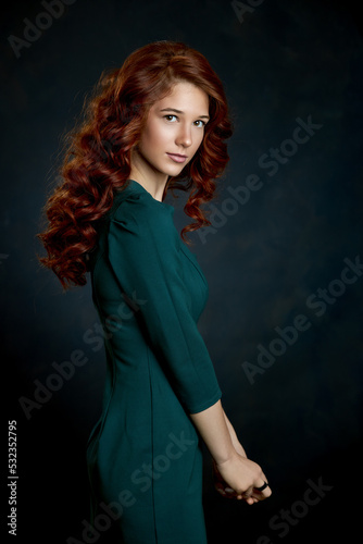 girl with red hair studio beauty portrait