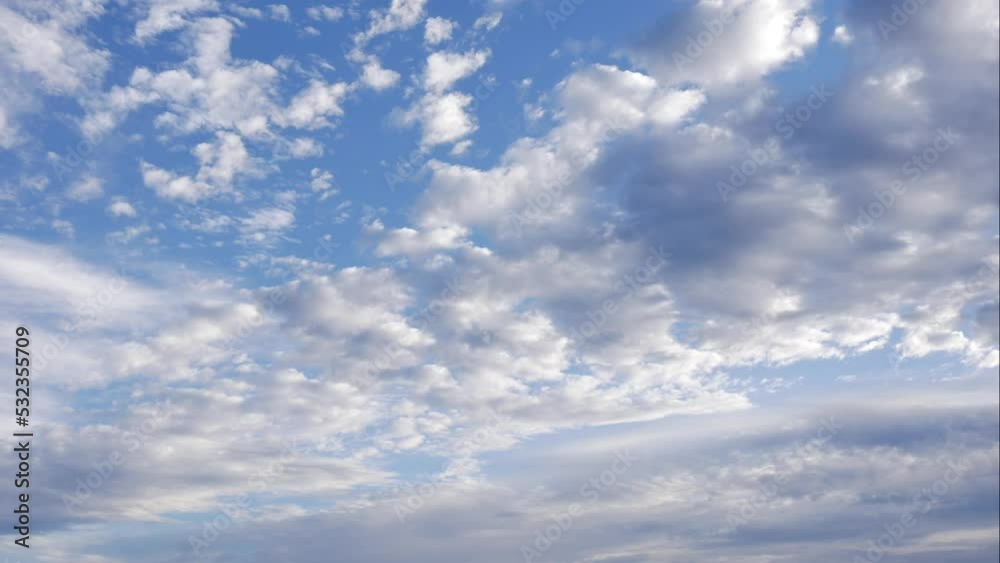 Blue sky white clouds. Puffy fluffy white clouds. Cumulus cloud scape timelapse. Summer blue sky time lapse. Dramatic majestic amazing blue sky. Soft white clouds form. Clouds time lapse background Blue sky white clouds. Puffy fluffy white clouds. Cumulus cloud scape timelapse. Summer blue sky time lapse. Dramatic majestic amazing blue sky. Soft white clouds form. Clouds time lapse background