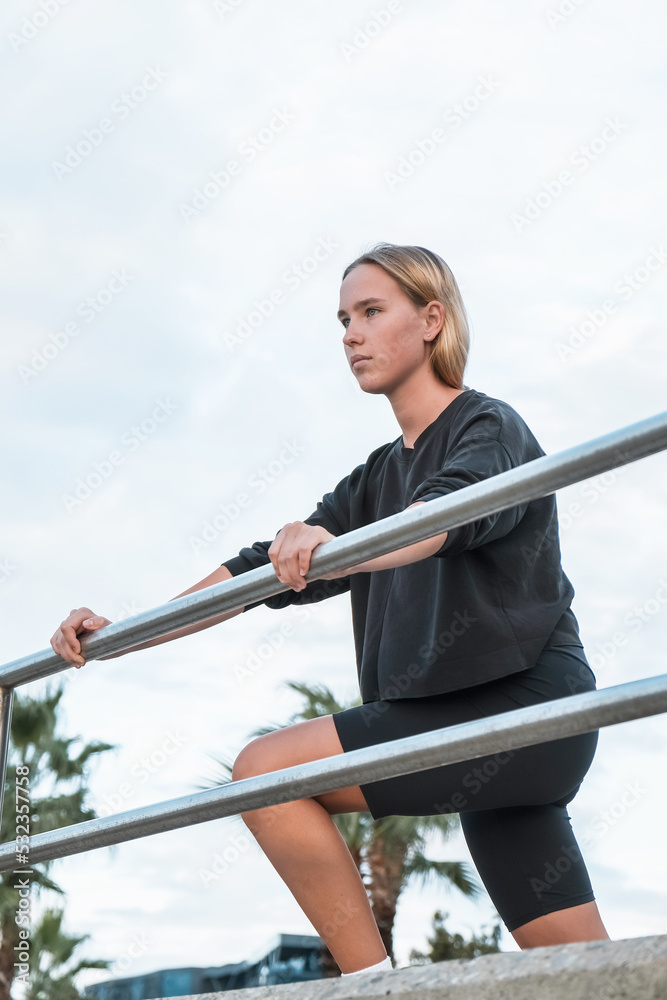 Obraz premium sport fit outdoor sea.girl goes sports,fitness,yoga seashore.Meditation, relaxation, mental health.Active lifestyle, self-care, health.Wellness.Fit nature.myofascial release workouts tracking fitness