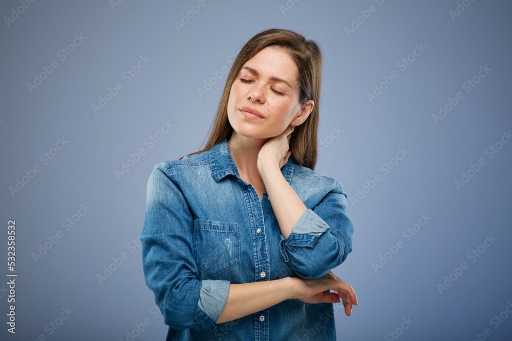 Woman with headache and eyes closed touching her face. isolated portrait on blue background. Woman with headache and eyes closed touching her face. isolated portrait on blue background.