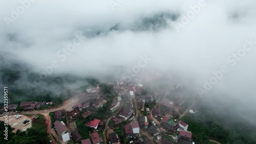 mountain ridge and clouds in rural jungle bush forest. Ban Phahee, Chiang Rai Province, Thailand photo