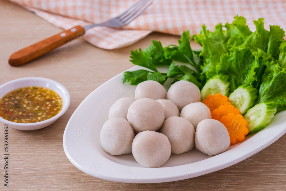 Boiled fish balls and vegetable on white plate. Boiled fish balls and vegetable on white plate.