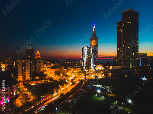 BAtumi Lights city at Night.Tourist landmark panorama from aerial perspective. Embankment of Batumi, Georgia.