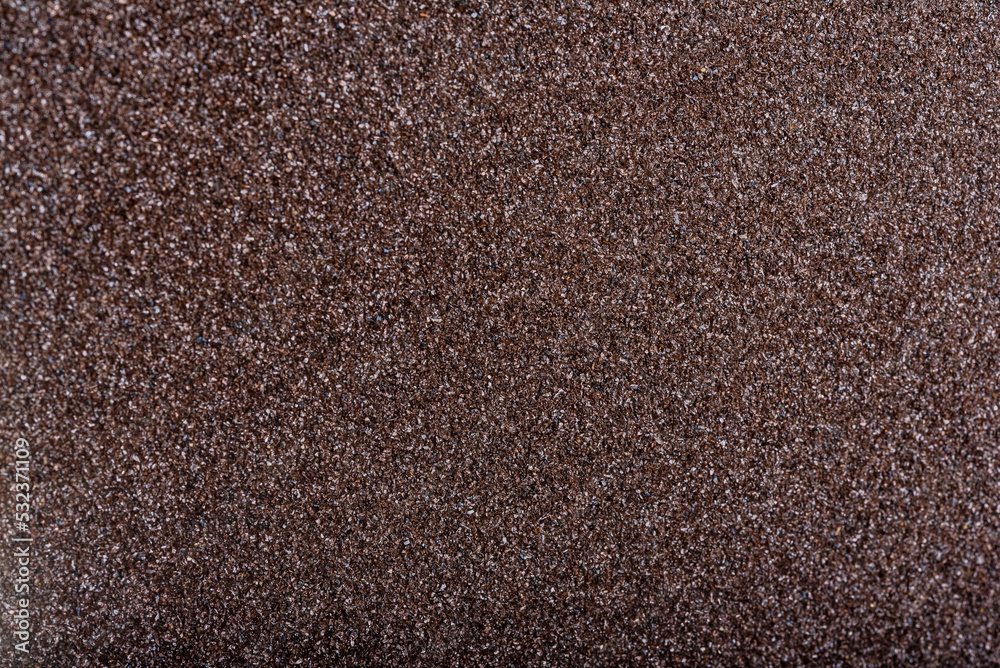 Fototapeta premium matte grungy sandpaper background closeup
