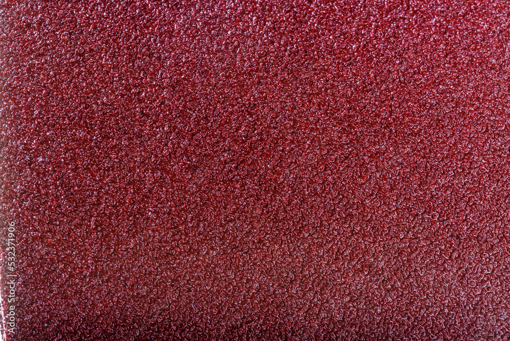 Fototapeta premium matte grungy sandpaper background closeup