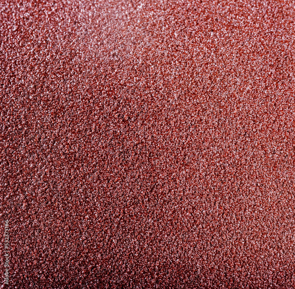 matte grungy sandpaper background closeup matte grungy sandpaper background closeup