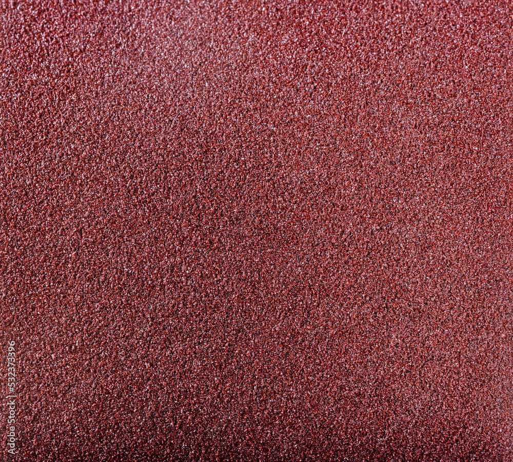 matte grungy sandpaper background closeup matte grungy sandpaper background closeup