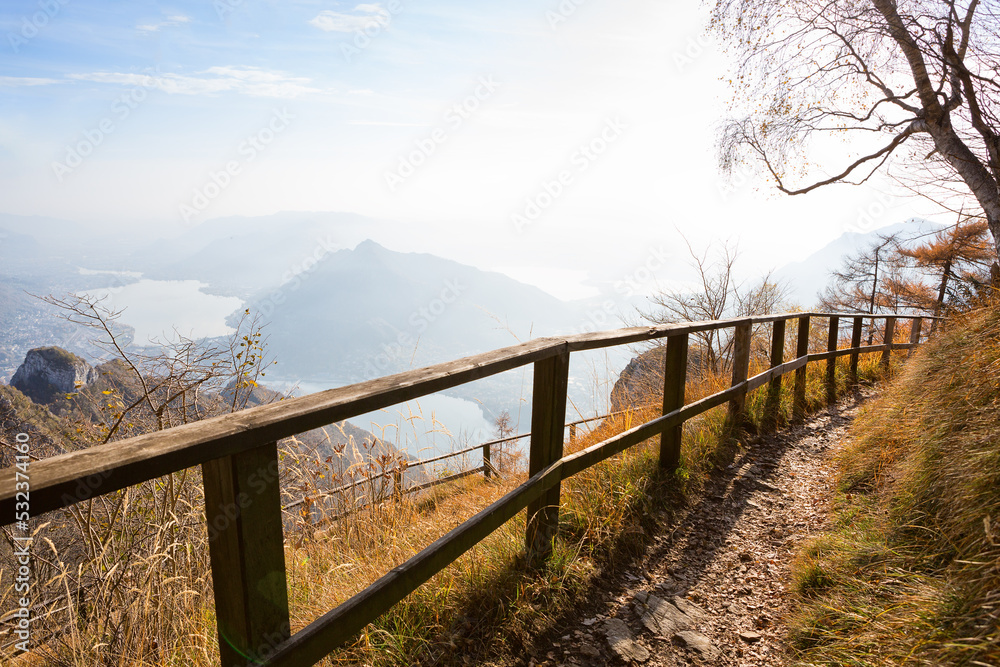 The hiking trail  with a panoramic view from Parco Valentino - Piani Resinelli in autumn, Ballabio, Lombardy, Northern Italy.