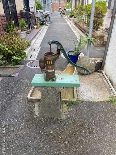 Vintage well at the narrow street of Nezu, Tokyo Japan year 2022