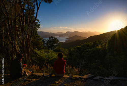 Sunset overlooking Nikau Cove, Marlborough Sounds, New Zealand photo