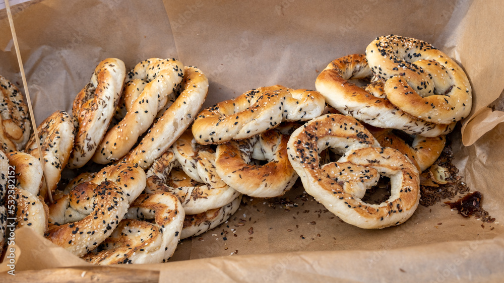 fresh freshly baked pretzels with seeds. handmade Latvian craftsman's market