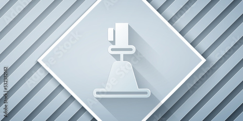 Paper cut Tacheometer, theodolite icon isolated on grey background. Geological survey, engineering equipment for measurement and research. Paper art style. Vector