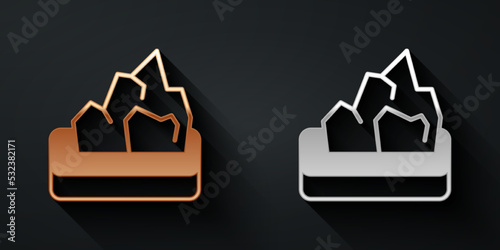 Gold and silver Ore mining icon isolated on black background. Long shadow style. Vector