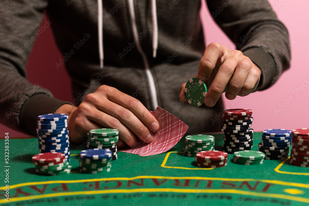 The player makes a bet in poker.