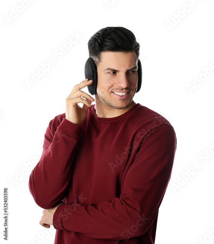 Man wearing stylish earmuffs on white background