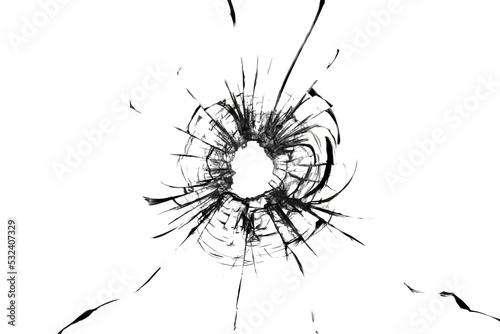 Fototapeta Broken glass, the texture of cracks from a shot through a bullet window