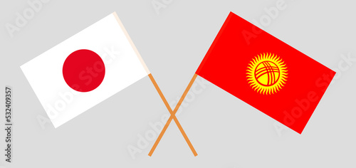 Crossed flags of Japan and Kyrgyzstan. Official colors. Correct proportion