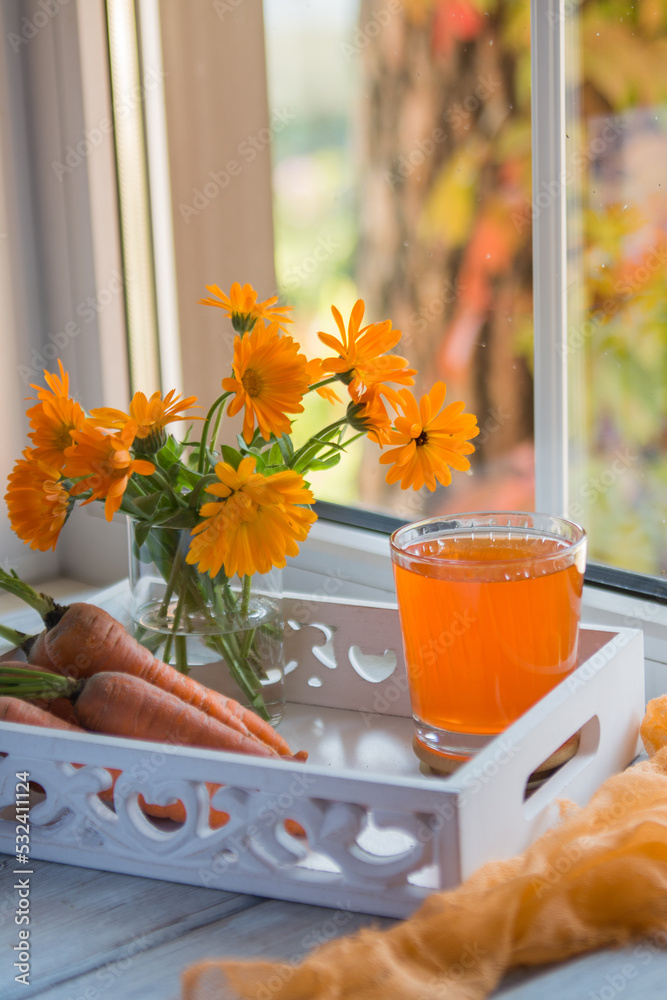 custom made wallpaper toronto digitalCarrot juice in a glass and fresh carrots on the table.
