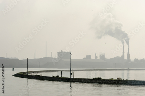 Rotterdam, The Netherlands, September 4, 2022: somwhat hazy scene on the junction of Oude and Nieuwe Maas rivers photo