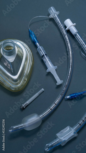 a set for intubation and general anesthesia with a mask for a ventilator, in dark background