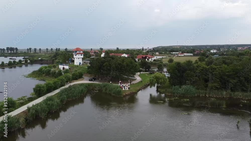 Drone - Outdoor event pullback over lake. Drone - Outdoor event pullback over lake.