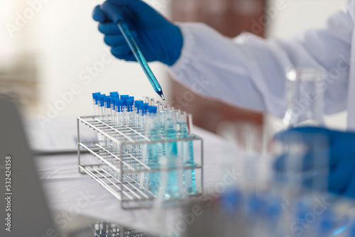 Scientists work with in vitro reagents in laboratories and draw conclusions from their research.