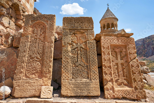 Old carved khachkars in armenian church photo
