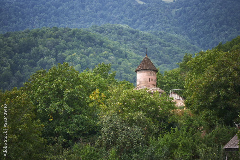 Monastery roof in the woods of Armenia