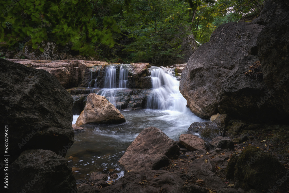 Small waterfall at Sarnajur river in the woods Small waterfall at Sarnajur river in the woods