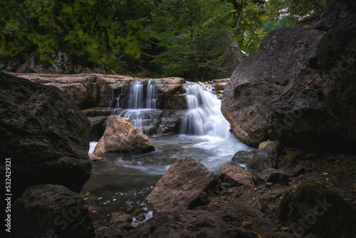 Small waterfall at Sarnajur river in the woods © vladimirzhoga