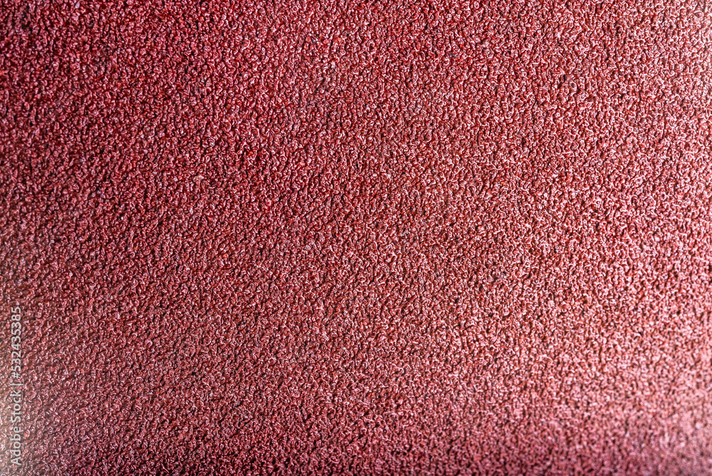 Fototapeta premium matte grungy sandpaper background closeup